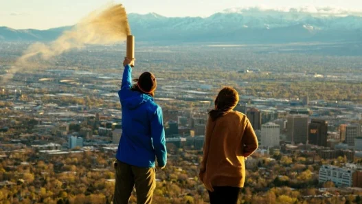 people spreading ashes from an urn