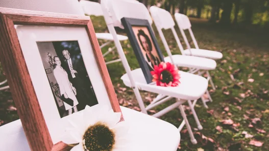 chairs with images of deceased on