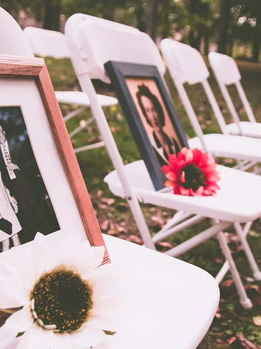 chairs with images of deceased on