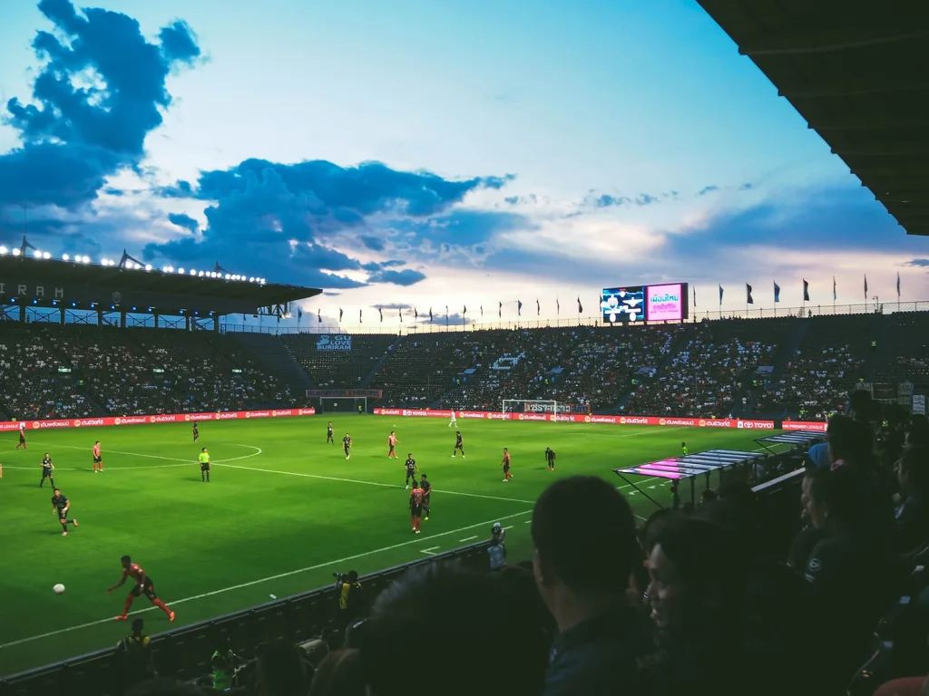 football stadium with match in play