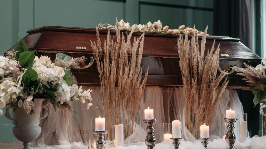 funeral casket with flowers
