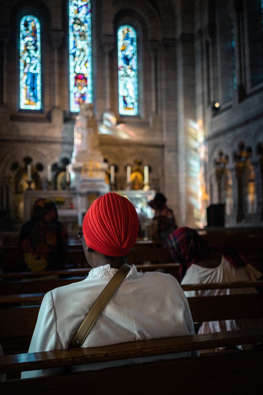 person sitting inside church