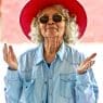 woman wearing red hat and sunglasses