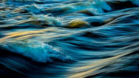 macro photography of water waves