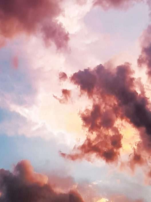 down angle photography of red clouds and blue sky