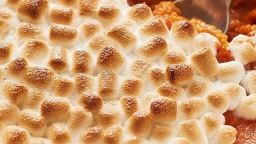 sweet christmas potatoes in a blue cooking dish