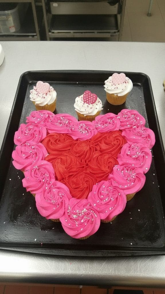 pink and red Pull Apart Cupcake on a black baking tray