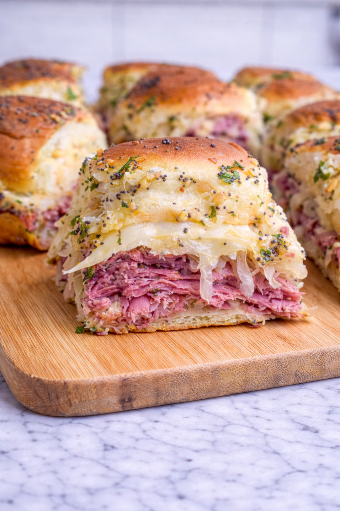 Cornbeef Reuben Sliders on wooden board