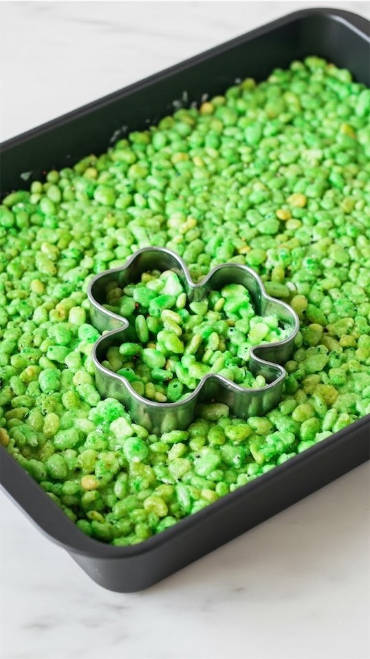 Shamrock Green Rice Krispie mixture in a black pan