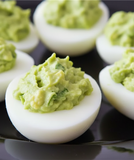 avocado deviled eggs black plate