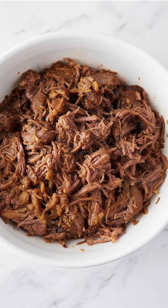 beef shredded in white bowl