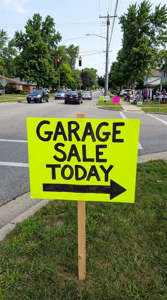 large neon Garage Sale sign