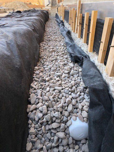 gravel trench lining vegetables