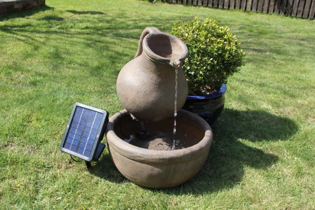 jug pouring water in garden