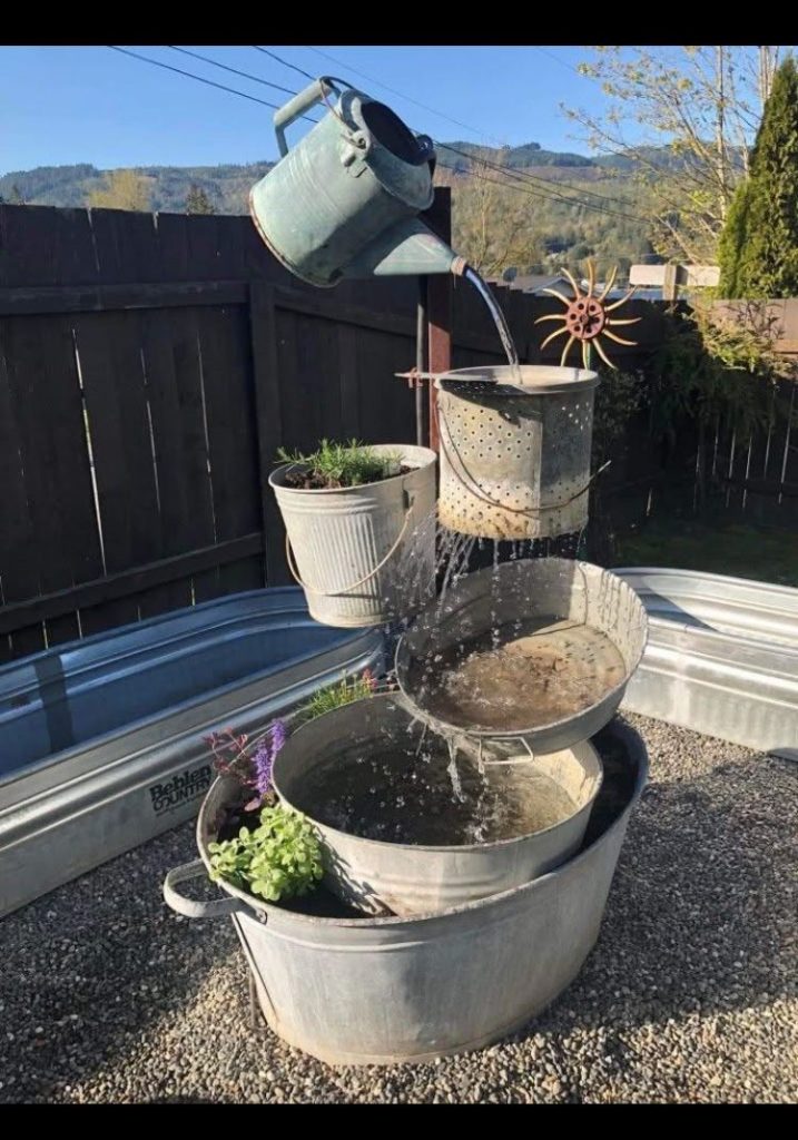 old cans and buckets DIY Solar Water Fountain