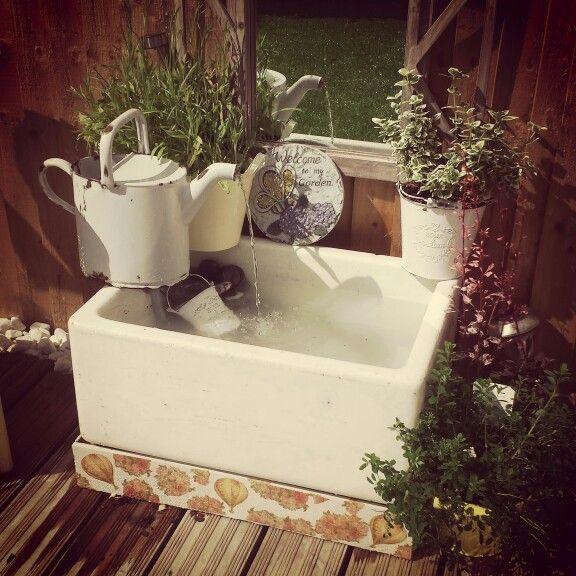 old sink turned into a garden feature